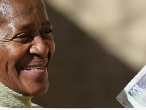 women holding cash money